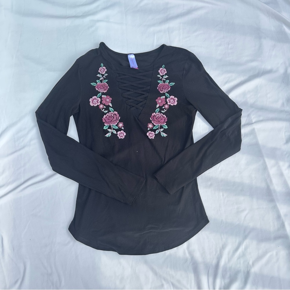 Women’s black floral crisscross top
